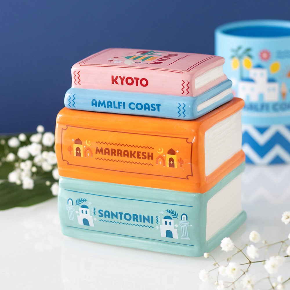 quemador para wax melts con forma de libros de viaje